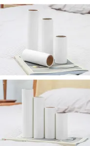 Set of four different sizes of white lint roller paper refill rolls for clothes