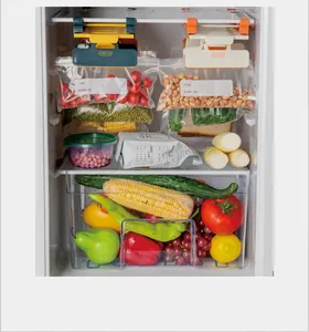 Detail view of hanging refrigerator organizer rack with sealed plastic food bags