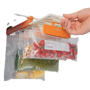 Space-saving sliding refrigerator storage rack with hanging food sealer bags system