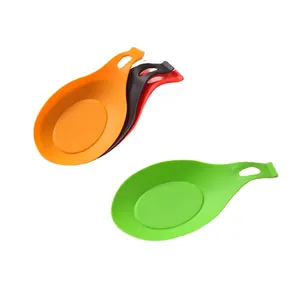 Heat-resistant silicone spoon rest set for kitchen utensils, colorful and easy to clean.