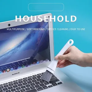 Versatile white crevice cleaning brush with soft bristles for laptop keyboard and window grooves