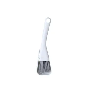 Ergonomic white crevice cleaning brush with grey stiff bristles for window grooves and seams