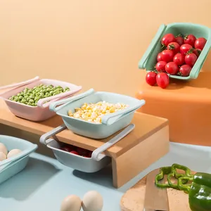 Set of colorful extendable fridge storage baskets for organizing fruits and vegetables