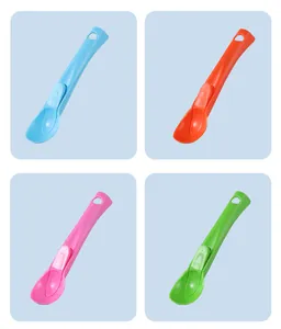 Set of four colorful plastic ice cream scoops for effortless fruit or dessert balls.