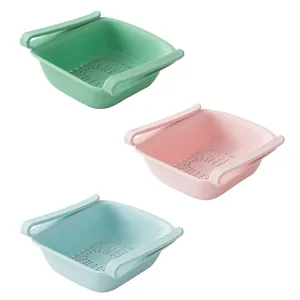 Set of 3 extensible refrigerator storage baskets in pastel pink, green, and blue colors