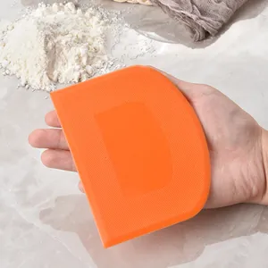 Professional orange D-shaped plastic dough scraper for baking and cake decorating tools