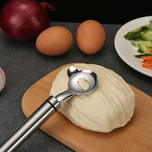 Stainless steel Shanxi sliced noodle cutter tool with ergonomic handle on wooden board