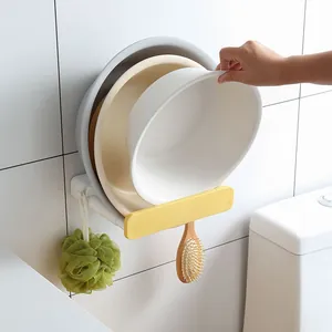 Multipurpose no-drill retractable washbasin storage rack for bathroom and kitchen wall
