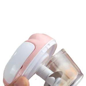 Manual mini garlic chopper with sharp stainless steel blades and pink container