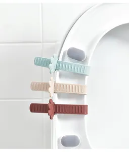 Gedetailleerd overzicht van de siliconen toiletbrilheffers op een witte toiletbril