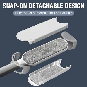 Brosse anti-peluches statique portable dotée d'une boucle détachable pour un nettoyage aisé.