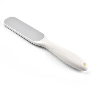 Ergonomic white foot file callus remover with gray abrasive surface for smooth skin