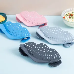 Set of colorful silicone pot strainers for kitchen vegetable and noodle draining