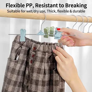 Grucce per pantaloni in plastica resistente e antiscivolo con clip per gonne e pantaloni