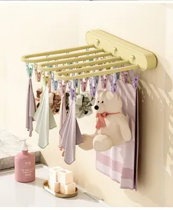 Multipurpose wall-mounted foldable drying rack with 24 clips for laundry and socks
