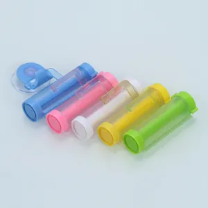 Set di cinque spremidentifricio colorati in plastica con ventose per fissaggio a muro