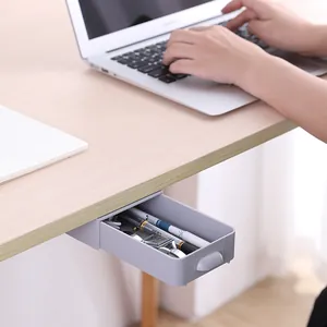 Hidden under-desk self-adhesive drawer organizer for stationery and office storage.