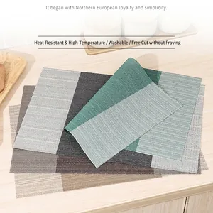 Hitzebeständiges Platzset aus PVC-Gewebe für Esstische und minimalistische Dekoration.