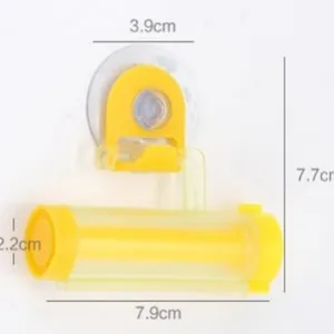 Spremi dentifricio giallo con ventosa e indicazioni delle dimensioni su sfondo bianco