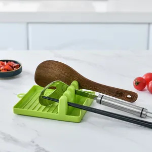 Repose-cuillère en silicone vert pour plan de travail de cuisine avec fentes