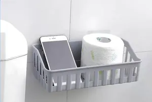 Grey wall-mounted plastic bathroom storage basket holding a smartphone and toilet paper