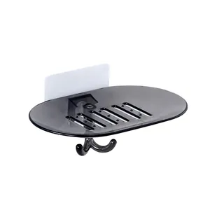 Wall-mounted self-draining soap dish with integrated hook in smoke grey plastic