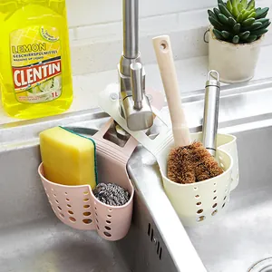 Functional kitchen sink caddy hanging bag for sponge and scrubber drainage in a modern sink
