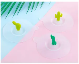 Detailed view of translucent silicone cup lids with cute green cactus handles