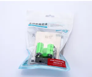 Support de serrage multifonctionnel en acier pour balai et serpillière sous emballage zip