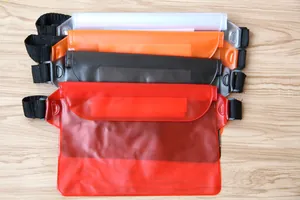 Close-up detail of multi-colored PVC waterproof waist bags for swimming and drifting