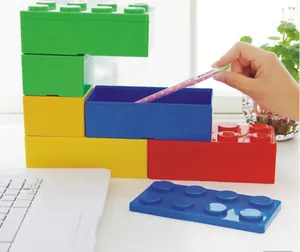 Close-up view of stackable colorful building block storage boxes for office stationery