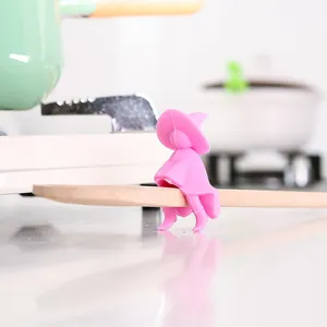 Soulève-couvercle de marmite en silicone rose en forme de petit bonhomme anti-débordement