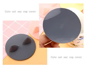 Detail view of cute cat ear silicone cup cover showing temperature resistance symbols.