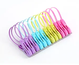 Set of 12 colorful plastic clothes clips with hanging rings for laundry drying