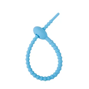 Flexible light blue silicone cable tie for data cable management and organization.