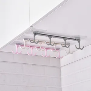 Self-adhesive under-cabinet hooks for kitchen organization shown in grey white and pink
