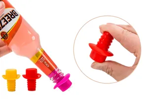 Durable food-grade silicone wine stoppers sealing a bottle and demonstrating flexibility.