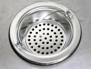 Macro view of stainless steel sink strainer with handle for kitchen and bathroom drains
