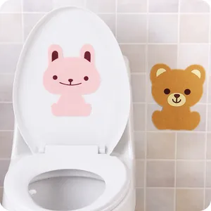 Cute cartoon animal felt toilet deodorant stickers shown in a clean bathroom setting.