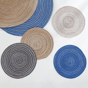 Set of circular woven cotton yarn heat-resistant placemats in assorted neutral colors