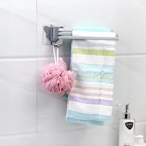 Portasciugamani rotante grigio con base adesiva a farfalla per il bagno