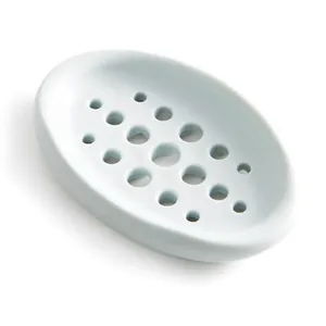 Minimalist oval silicone soap dish with multiple drainage holes for bathroom or kitchen