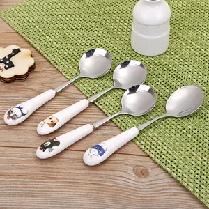 Creatieve roestvrijstalen kinderlepelset met schattige cartoon dierhandvatten.