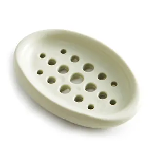 Creative minimalist light green silicone soap dish with drainage holes for bathroom or kitchen