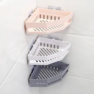 3er-Set Wandmontierte Eckregale aus Kunststoff für das Badezimmer in Rosa Weiß Grau.