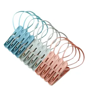 Juego de pinzas de plástico portátiles de colores con cuerdas para tender ropa