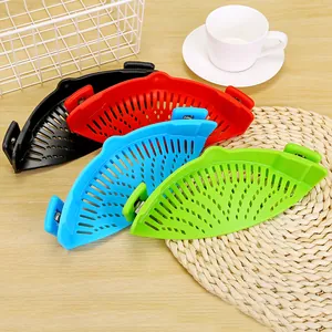 Colorful silicone clip-on pot strainers in four colors for kitchen vegetable draining