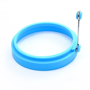 Round blue silicone egg frying ring with heat-resistant handle for perfect pancakes