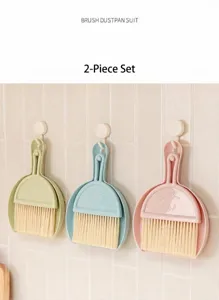 Mini brush and dustpan set for desktop cleaning in three pastel colors