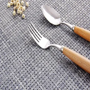 Close-up macro view of the grey woven texture on this heat-resistant dining placemat